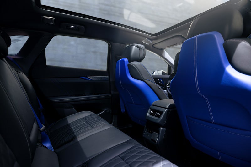 Back Seat View of the 2026 OPTIQ-V Blue Front Seats, Sun Roof, and Interior | Opequon Motors in Martinsburg WV